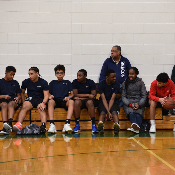 Beacon Academy students playing basketball