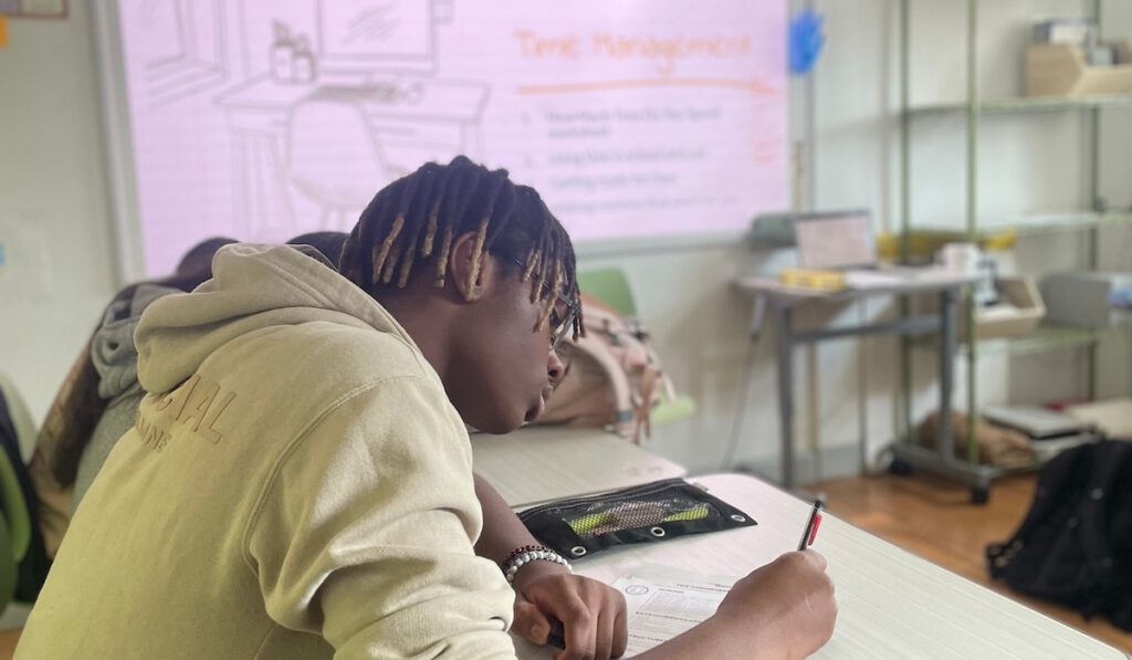 Beacon Academy student in a classroom