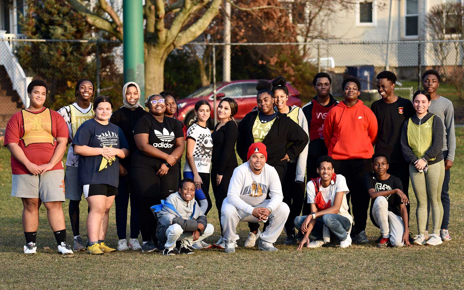 Group of Beacon Academy students learning to play soccer